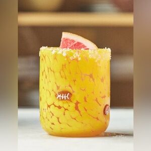 Yellow “confetti” football Patterned Glass. Handblown. Each one unique.